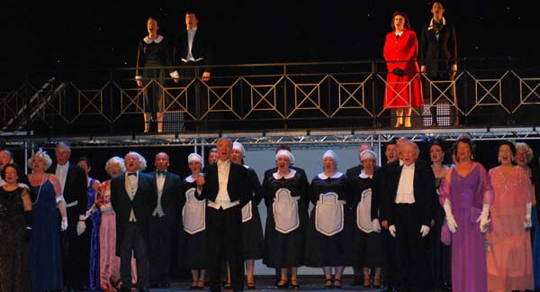 Lord Rothmore leads the company in 'Once in a Lifetime'